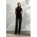 pantaloni svasati in pizzo con culotte