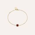 bracciale placcato oro con pietra rossa e zirconigirocollo placcato oro con pietra azzurra