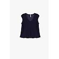 top fluido smanicato con scollo a v