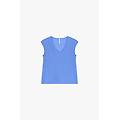 top fluido smanicato con scollo a v